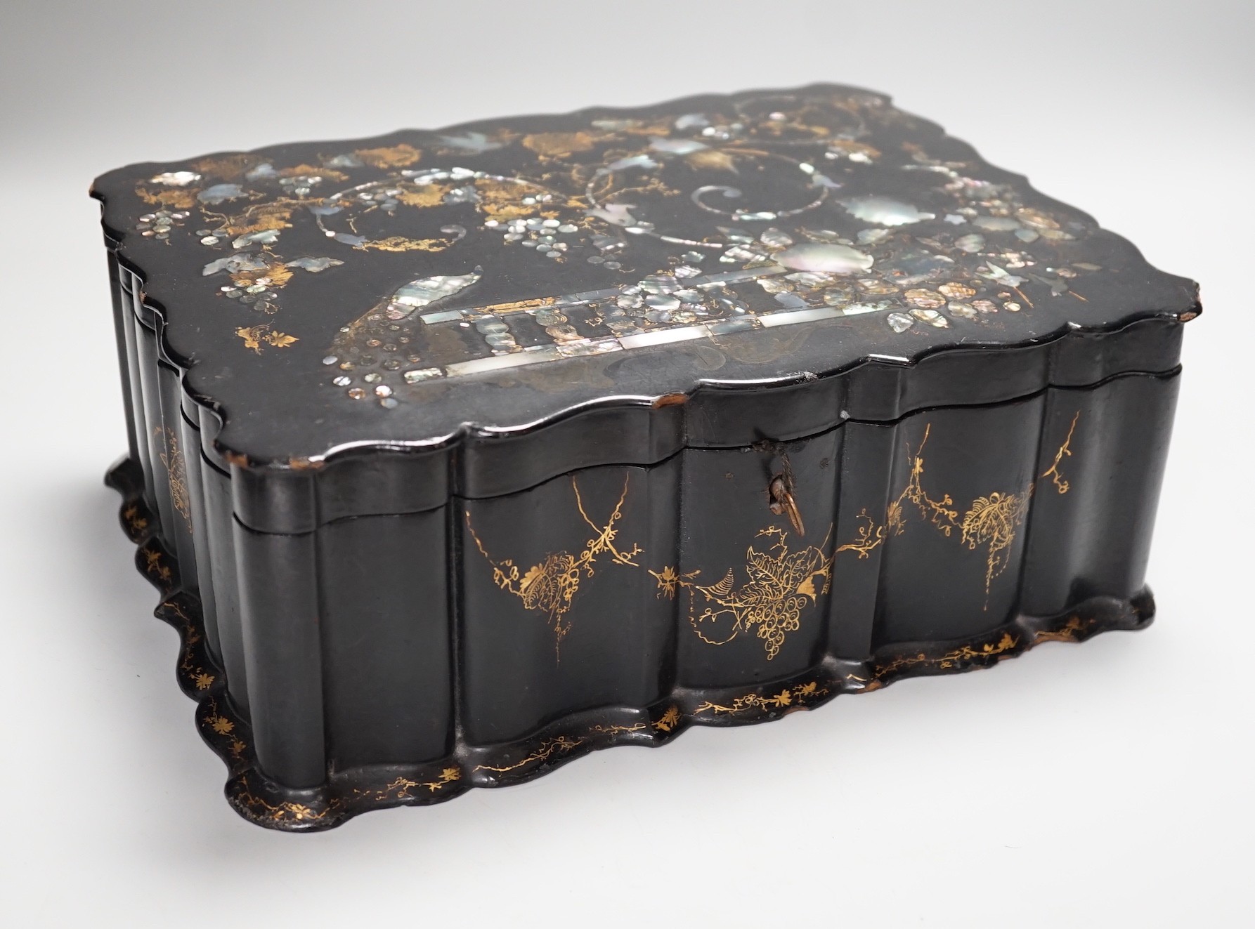 A Victorian papier mache workbox and contents, 32cm